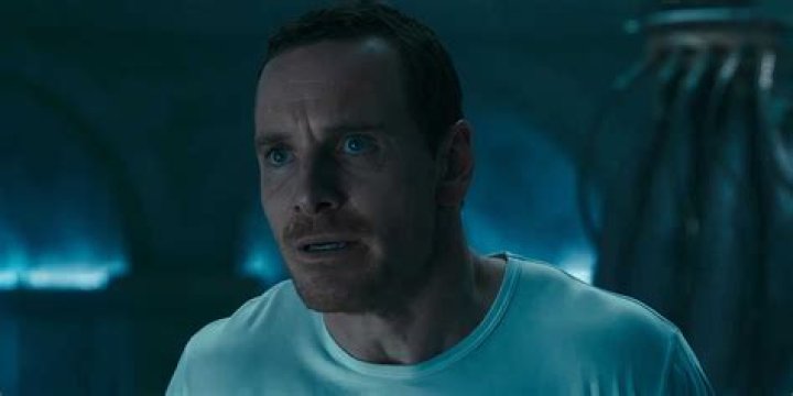 Michael Fassbender as Callum Lynch looking at lab notes in Assassin's Creed