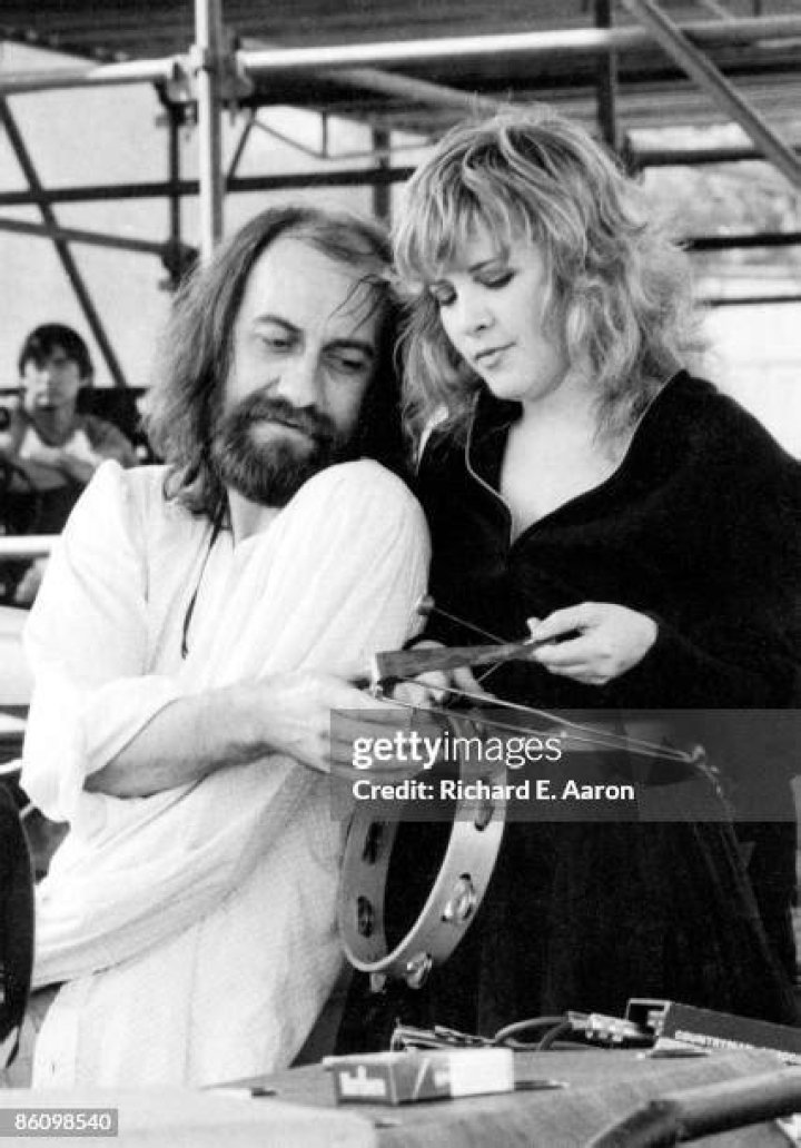 Mick Fleetwood and Stevie Nicks appear on the cover of Fleetwood Mac's Rumors