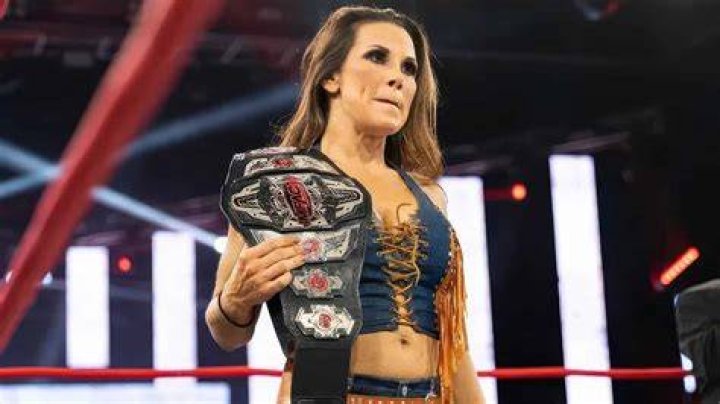 Mickie James celebrating in WWE