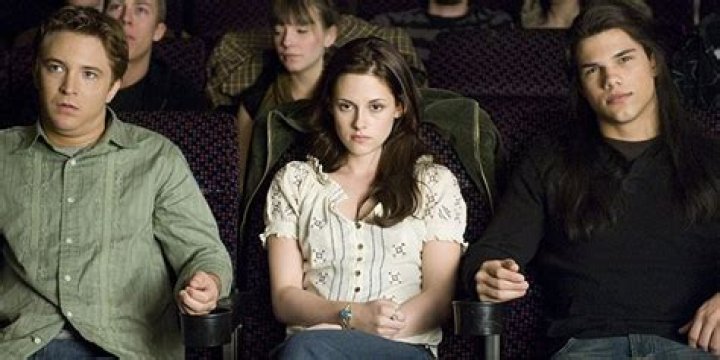 Mike, Bella, and Jacob at the movies