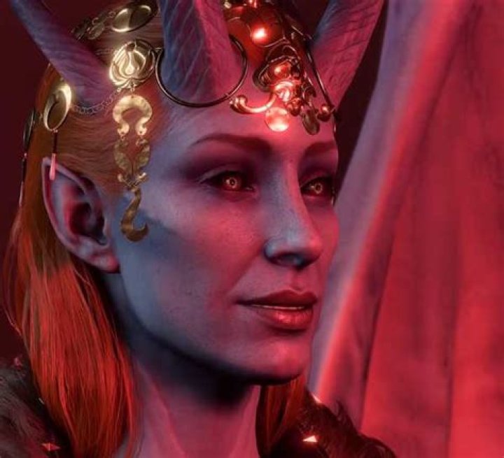 Mizora smiles pleasantly during a romance scene in Baldur's Gate 3