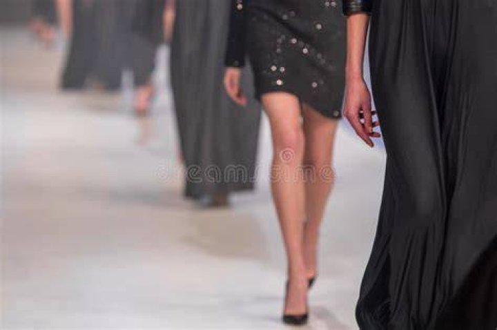 Models and designers walking down the runway in Project Runway