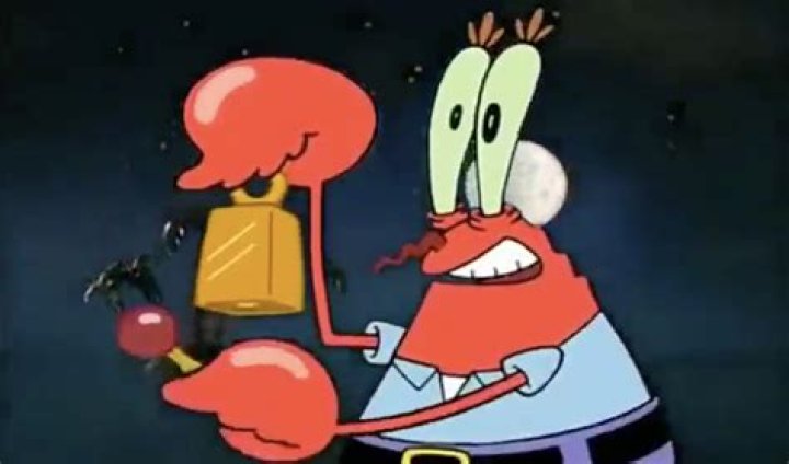 Mr. Krabs holding a sad SpongeBob in Driven To Tears in SpongeBob SquarePants