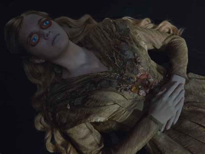 Myrcella from Game of Thrones, with a clip in her blonde hair.