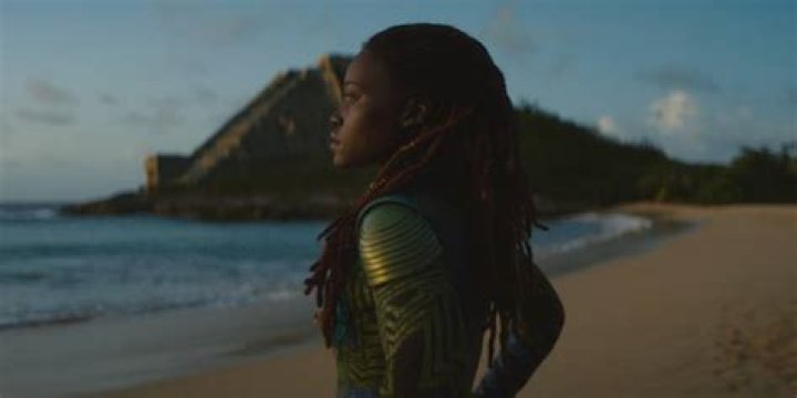 Nakia standing on a beach in Black Panther 2