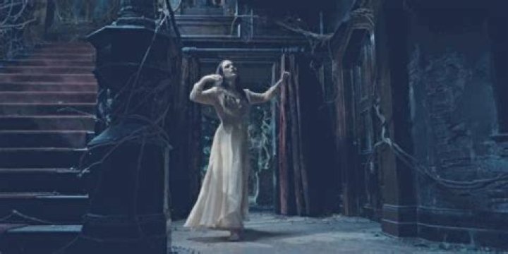 Nell dances with her imaginary husband in an abandoned house in The Haunting of Hill House.
