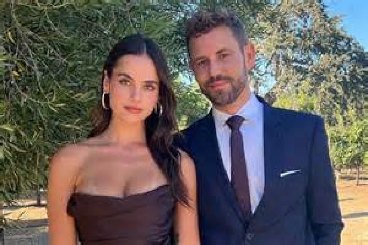Nick Viall from The Bachelor holding a rose