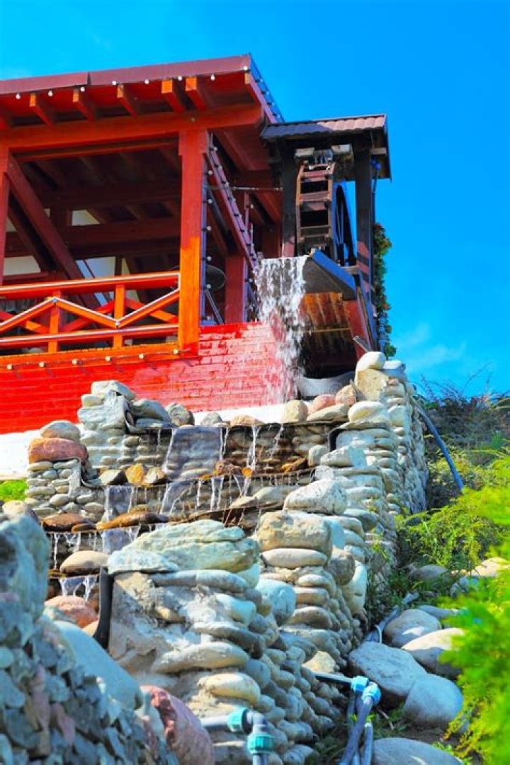 Old syle house with water mill, Stock Photo, Picture And Low Budget