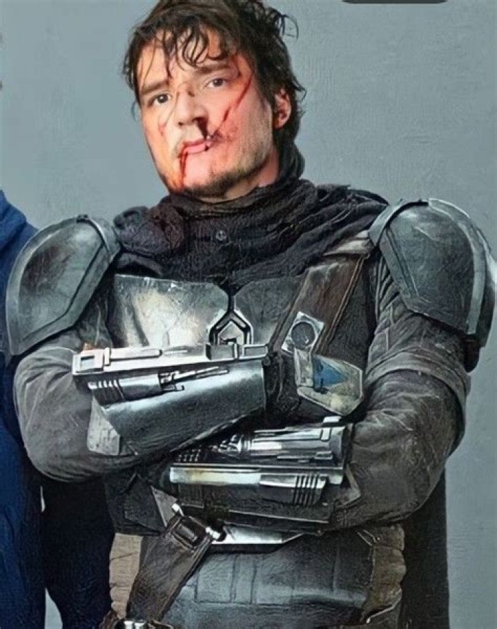 Pedro Pascal as Din Djarin flamethrower in The Mandalorian