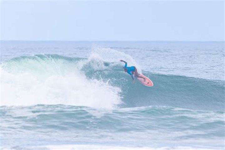 Pia competing during the 2023 New Zealand Surfing Championships held at Piha. Photo / Derek Morrison