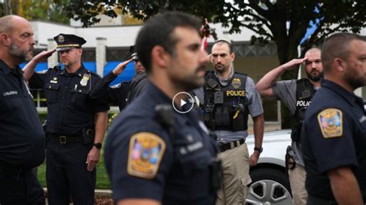 Police officers confront members of NWA on the sidewalk in Straight Outta Compton