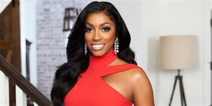 Porsha Williams posing for a photo in Real Housewives Of Atlanta