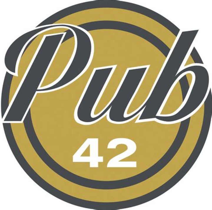 Pub 42 Bar & eatery with a patio offering familiar American fare and