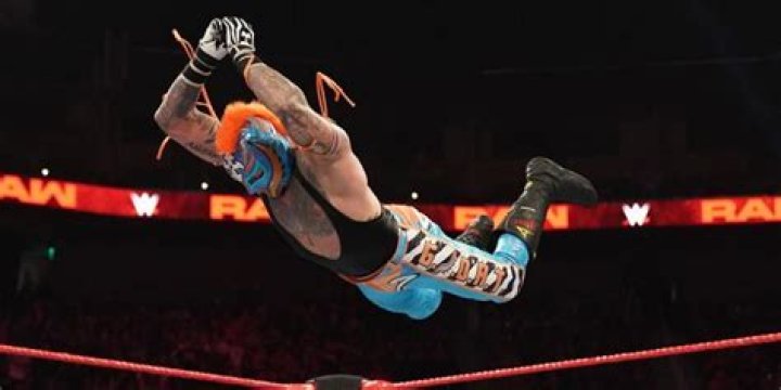 Rey Mysterio hitting a splash
