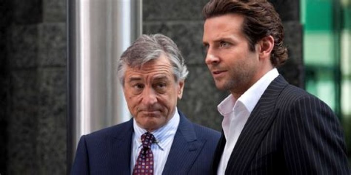 Robert De Niro looking at the camera during a funeral in The Irishman