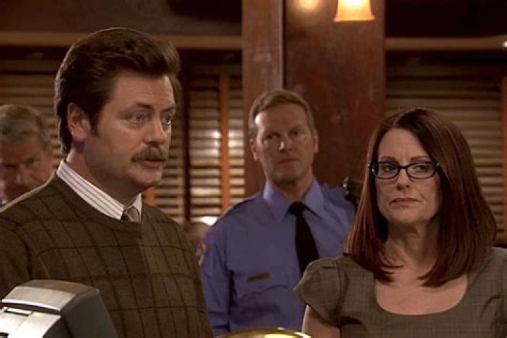Ron and Tammy kissing at the diner on Parks and Rec