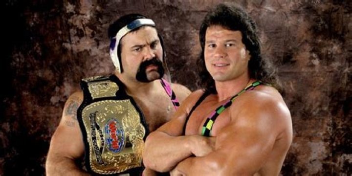 Scott Steiner and Rick Steiner with their singles championships