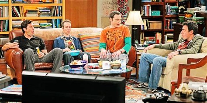 Sheldon Cooper sitting down and looking relaxed in The Big Bang Theory