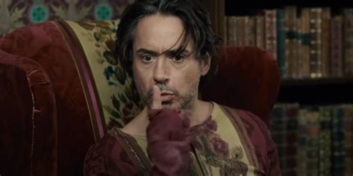 Sherlock camourflaged as a chair ib Sherlock Holmes A Game of Shadows