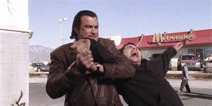 Simon fighting someone outside a McDonalds in Urban Justice.