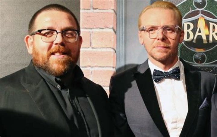 Simon Pegg and Nick Frost with guns in Hot Fuzz