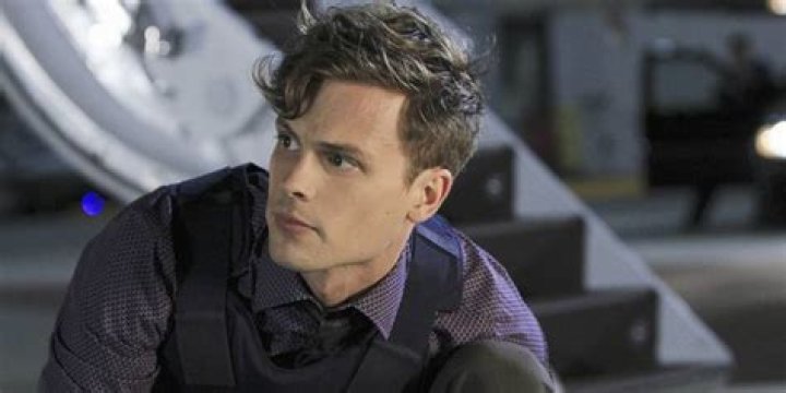 Spencer Reid chases after the serial killer Abel inside an abandoned building in Criminal Minds