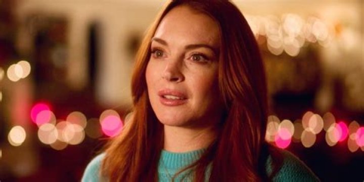 Split image of Lindsay looking serious on Gilmore Girls