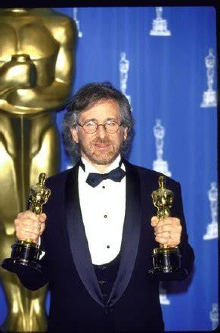 Steven Spielberg holding his Oscars.