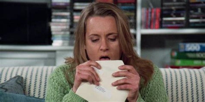 Susan licking an envelope on Seinfeld