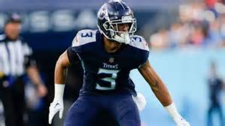 Tennessee Titans cornerback Caleb Farley sits outside the rubble of his home after an explosion. Photo / AP