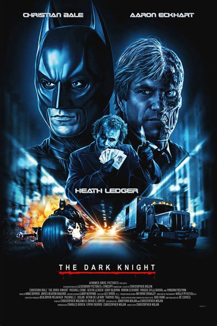 The Dark Knight poster of Batman in front of the flaming Bat Signal and Heath Ledger as The Joker