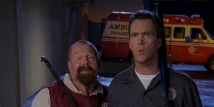 The Janitor and Troy holding a baseball bat and crowbar in Scrubs