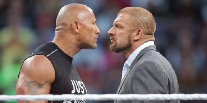The Rock and Triple H staredown at WrestleMania 31