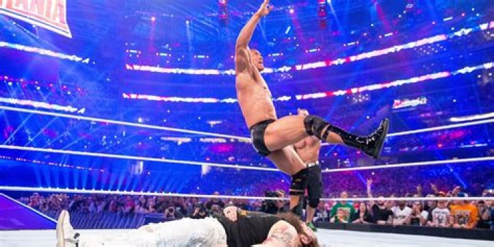 The Rock hitting the Peoples Elbow