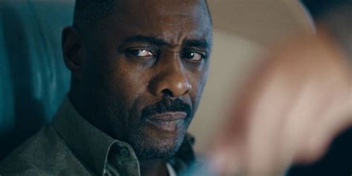 The Tracker looking off-screen in John Wick Chapter 4
