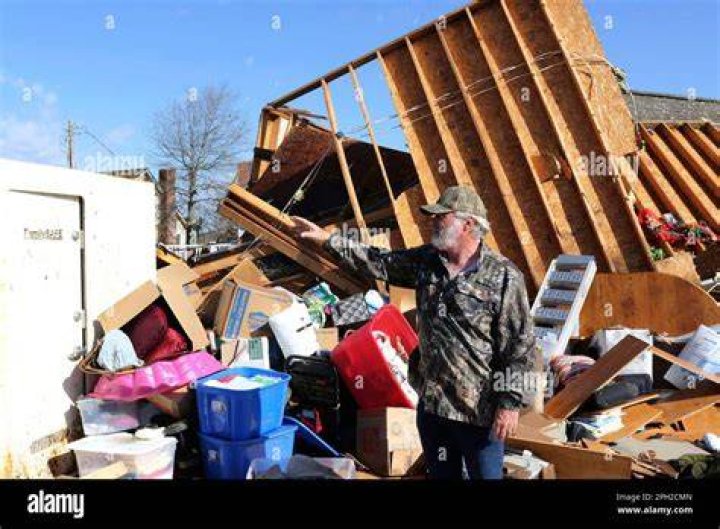 Tim Foster stands outside the safe room where he and his wife took shelter. Photo / AP