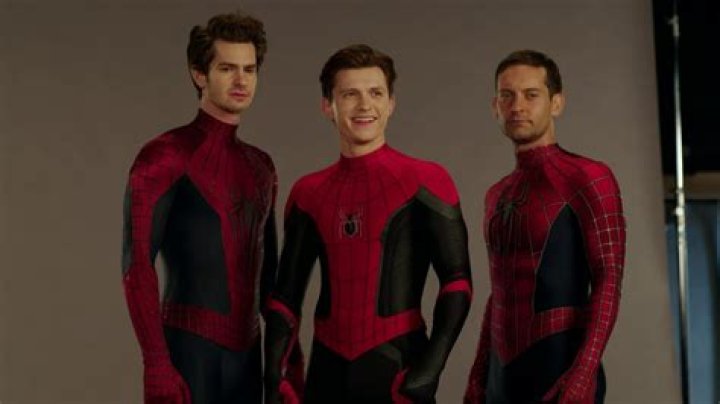 Tobey Maguire, Andrew Garfield, and Tom Holland's Spider-Men on top of the Statue of Liberty in Spider-Man No Way Home