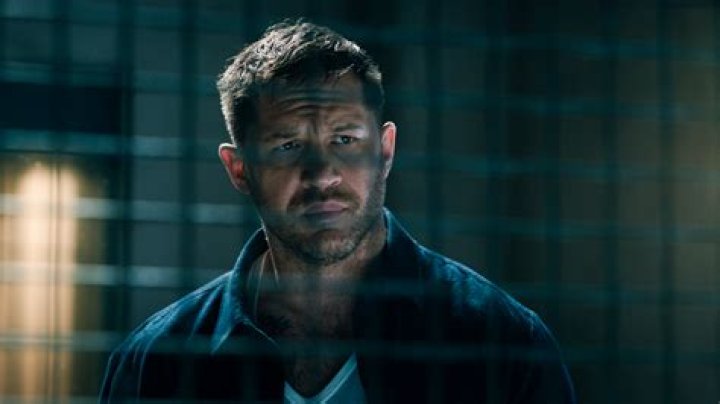 Tom Hardy as Eddie Brock in Venom