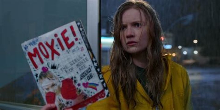 Vivian holding the Moxie zine