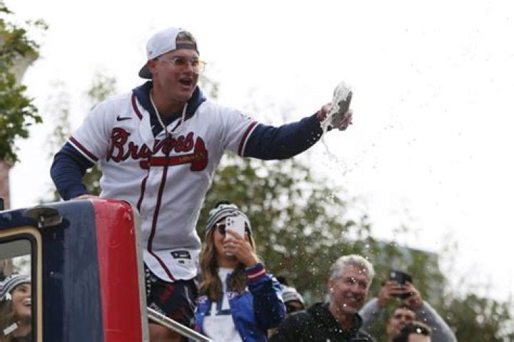 WATCH: Joc Pederson Throws PEARL Necklaces to Fans During Atlanta Braves Victory
Parade