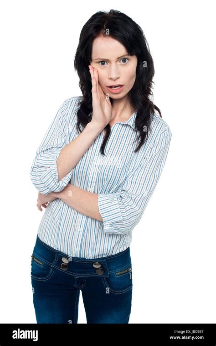 Woman with hand on her back